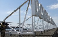 В здании аэропорта Донецка, окруженном ополченцами, произошел пожар