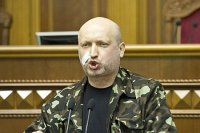 Дурные привычки Турчинова: стройки на братских могилах