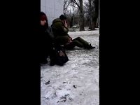 Донецк. Люди на остановке в момент обстрела