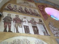 В Львове художники расписали стены храмов фигурами карателей с нимбами