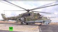 Вертолёты Ми-24 несут боевое дежурство на авиабазе в Сирии