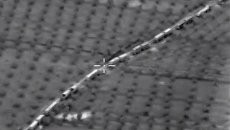 Беспилотник Минобороны РФ в Сирии заснял колонну грузовиков, перевозящих оружие из Турции