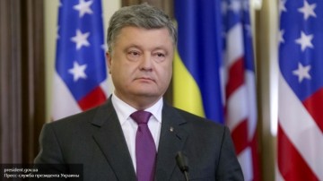 Порошенко зазывает Мэй в гости, чтобы выпросить денег на армию