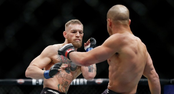 Бой года. Ирландия раздавила США. Макгрегор - первый в истории UFC чемпион в двух весовых категориях Бой года. Ирландия раздавила США. Макгрегор - первый в истории UFC чемпион в двух весовых категориях