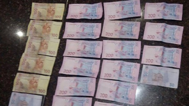 Украинского полицейского поймали на вымогании взятки с малолетнего ребенка