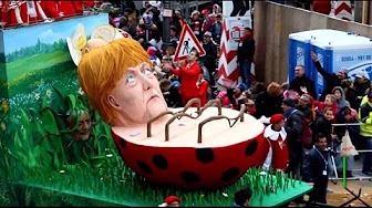 По улицам политиков водили: на параде в Кёльне высмеяли Трампа и Меркель