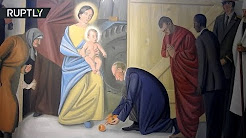 Витебский костёл украсили фресками с Путиным и Обамой