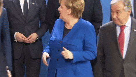 А где Путин? Меркель и Макрон "потеряли" президента России на конференции в Берлине — видео