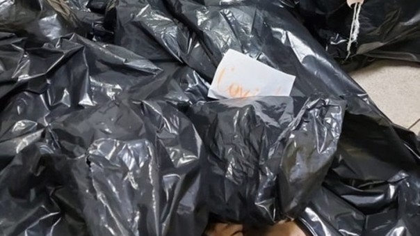 Начальника облздрава уволили после фотографий мешков с трупами